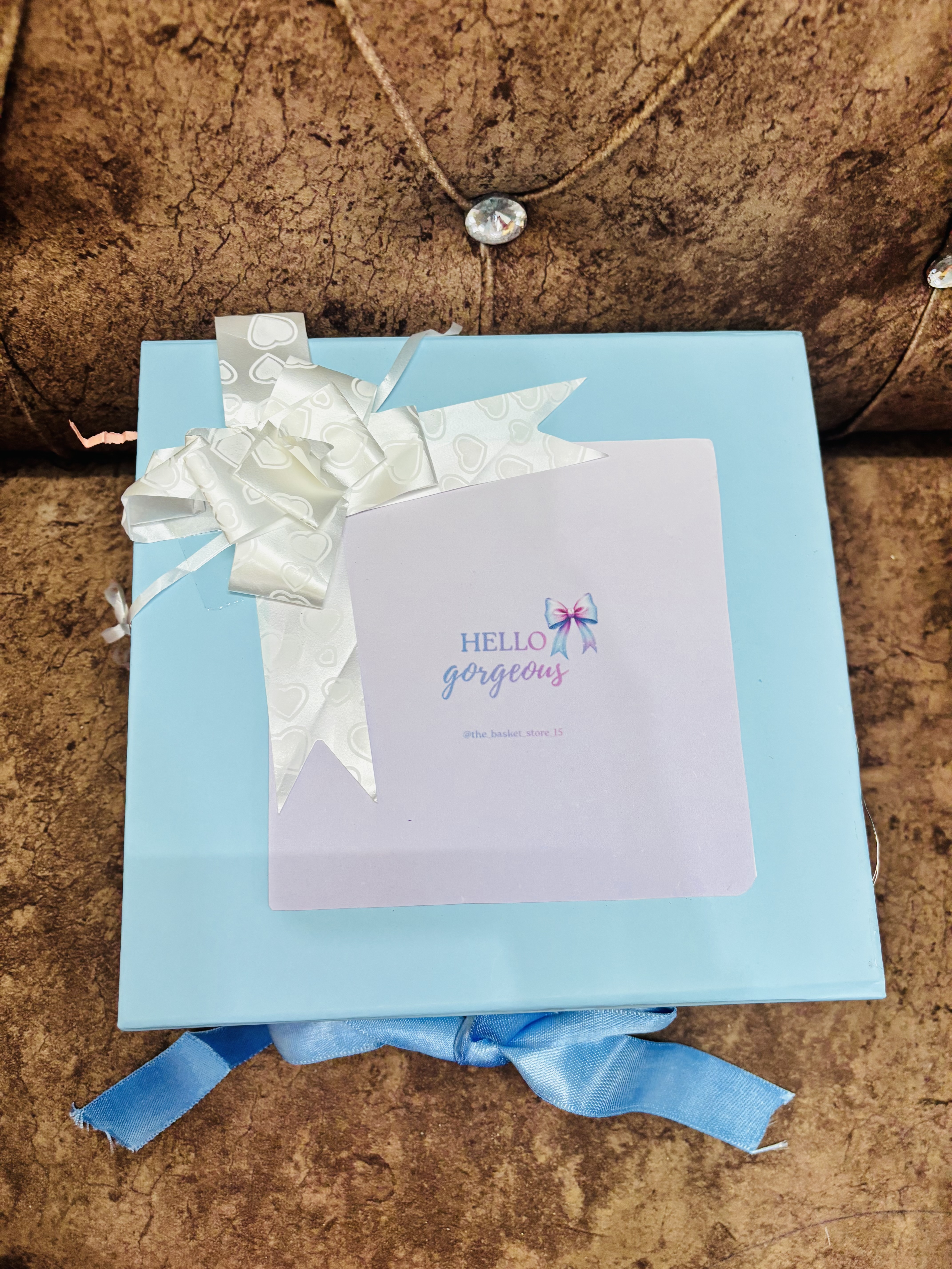 Add hello gorgeous with ribbon on top